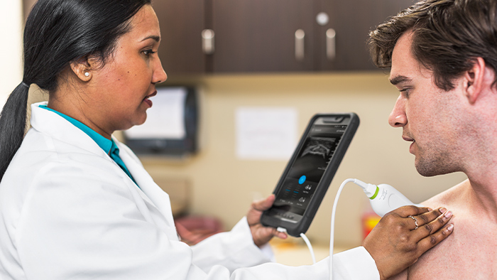 Tel&eacute;fono junto al producto Lumify